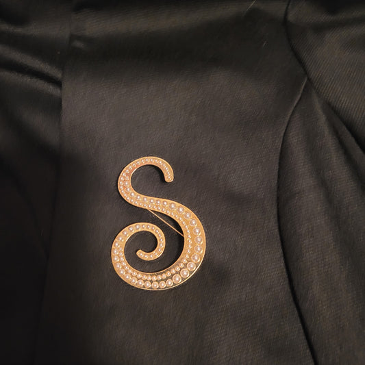 The letter S